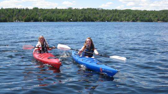 Two teens kayaking on Lake Vermilion