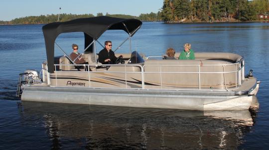 Premier Pontoon boat with family on Lake Vermilion