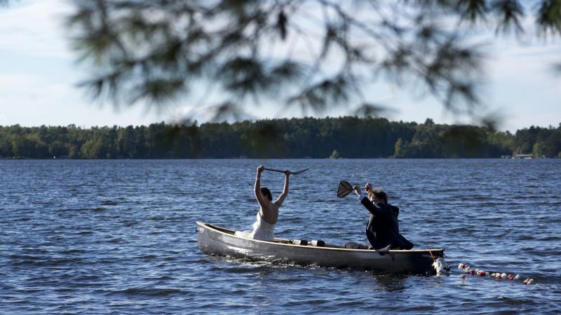 Just married couple in a canoe on Lake Vermilion