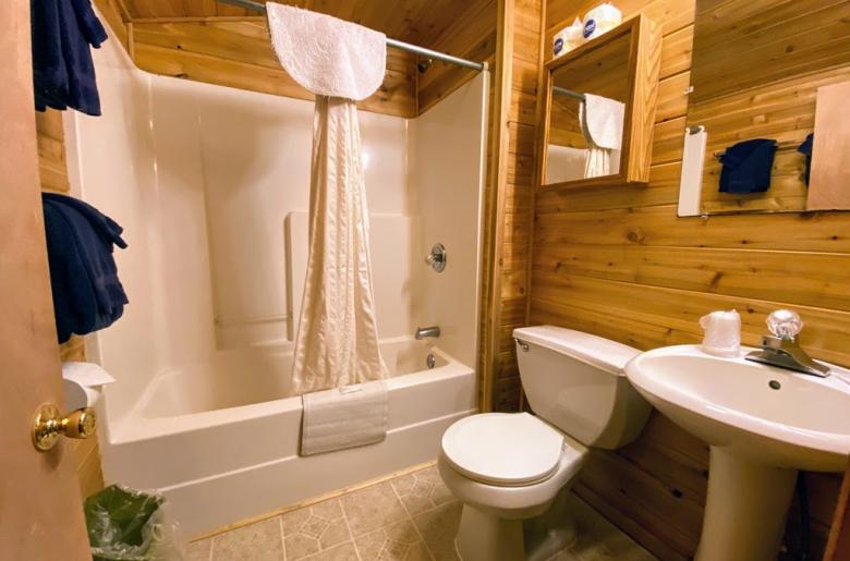 Bathroom with a standard tub/shower.