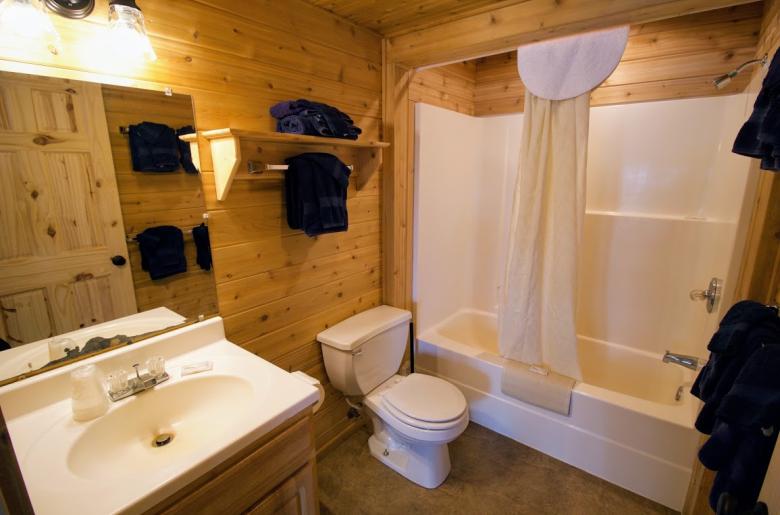 Bathroom with a standard tub/shower.