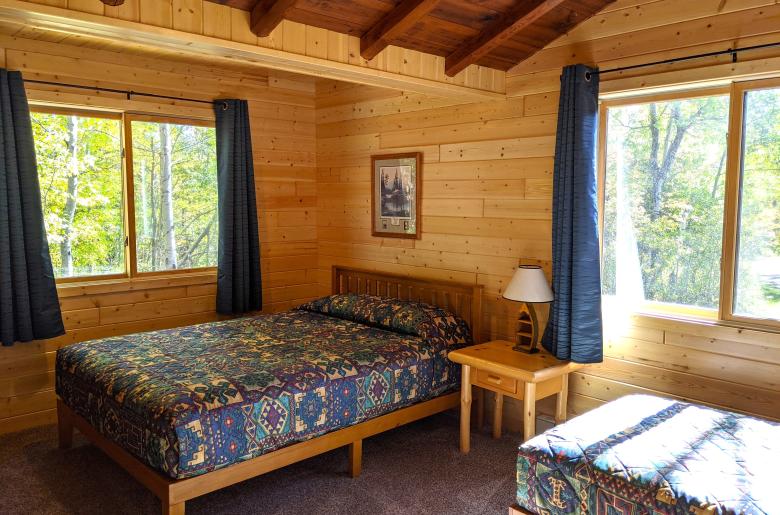 Bedroom with a queen and twin bed.