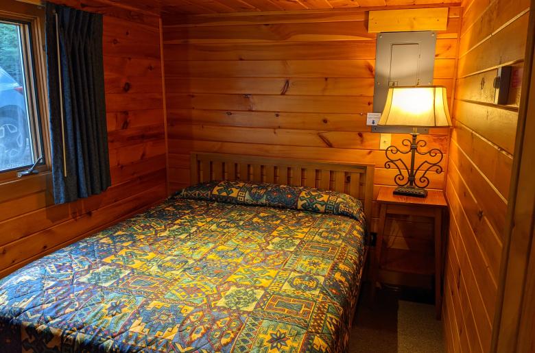 Bedroom with a queen bed.