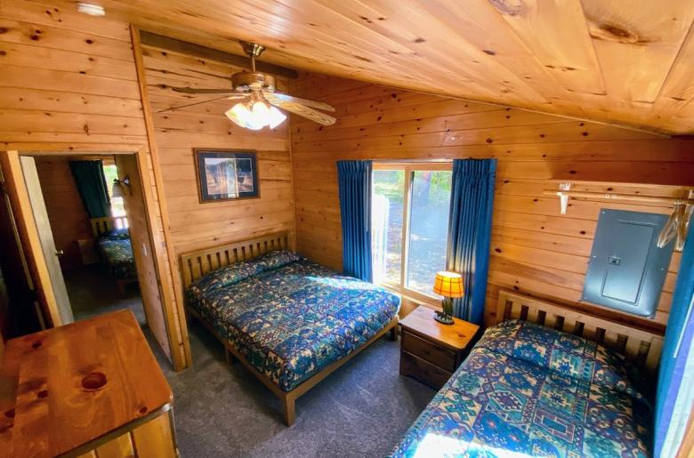 Bedroom with a queen and twin bed.