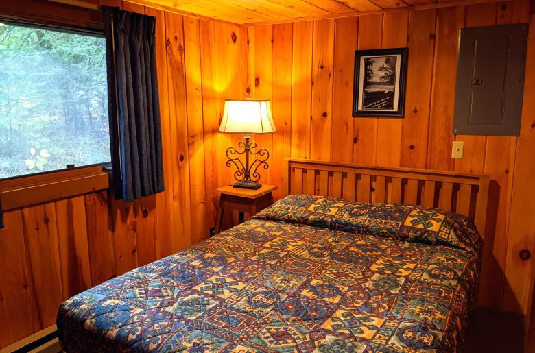 Bedroom with a queen bed.