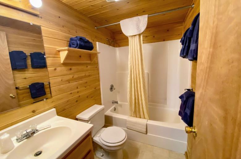 Master bathroom with a standard tub/shower.