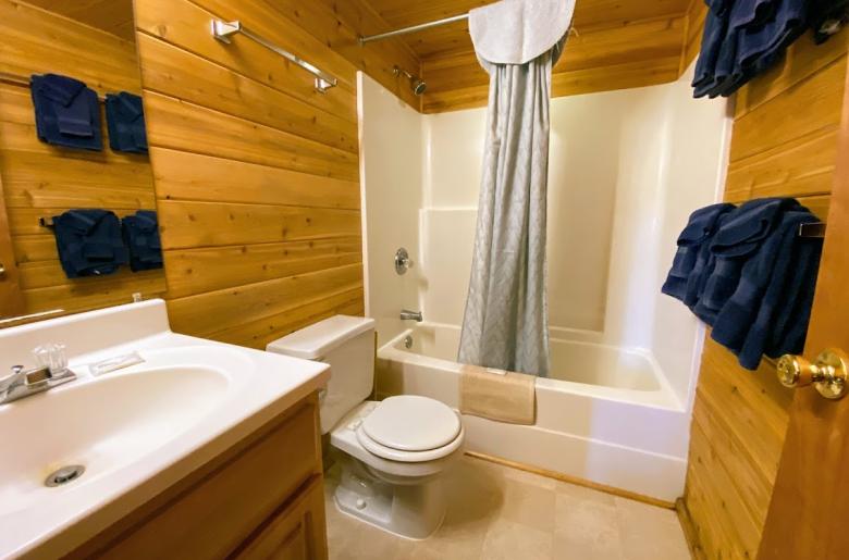 Master bathroom with a standard tub/shower.