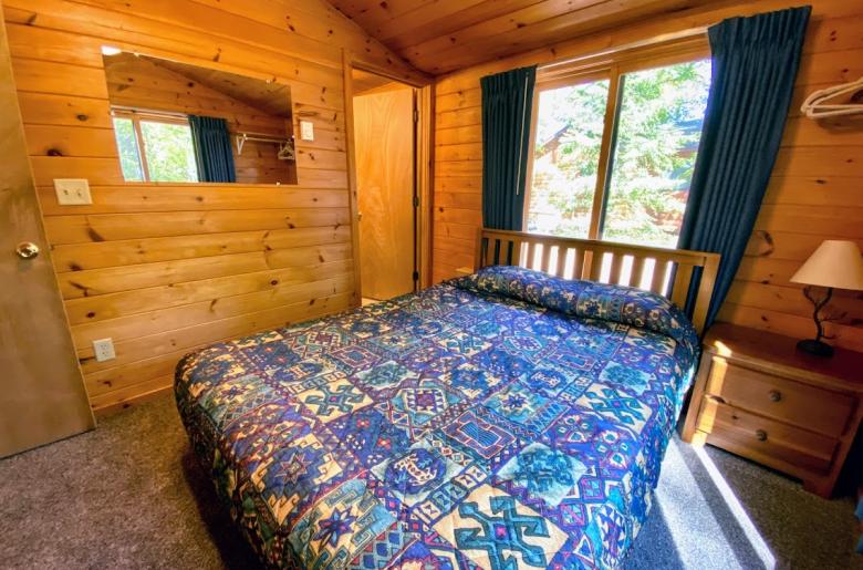 Master bedroom with queen size bed and ensuite bathroom.