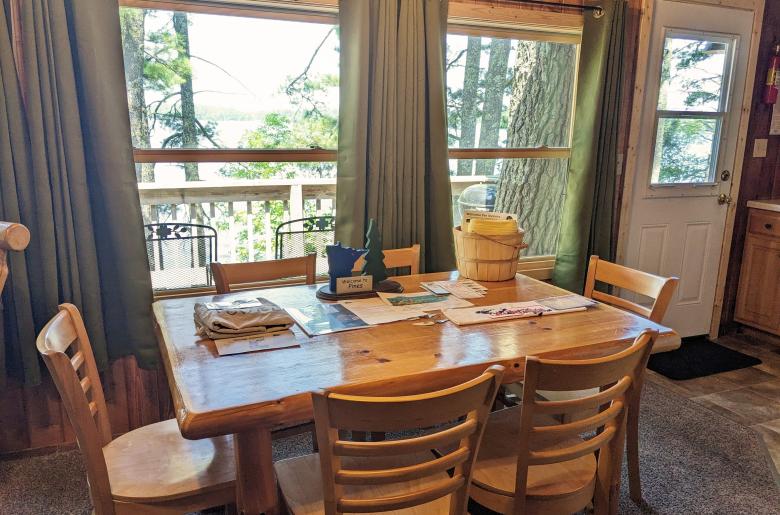 Dining room with seating for 6 and views of the lake.