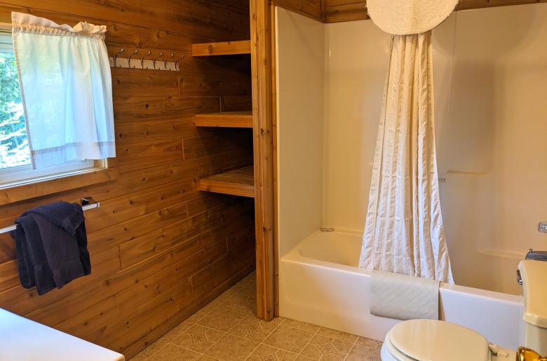 Upstairs bathroom with standard tub/shower.