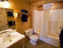 Bathroom with a standard tub/shower.