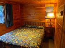 Bedroom with a queen bed.