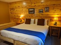 Main floor bedroom with a king bed.