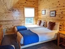 Upstairs bedroom with two XL twins and a regular twin.