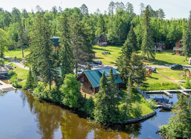 Aerial exterior of Lakeshore with water on two sides.