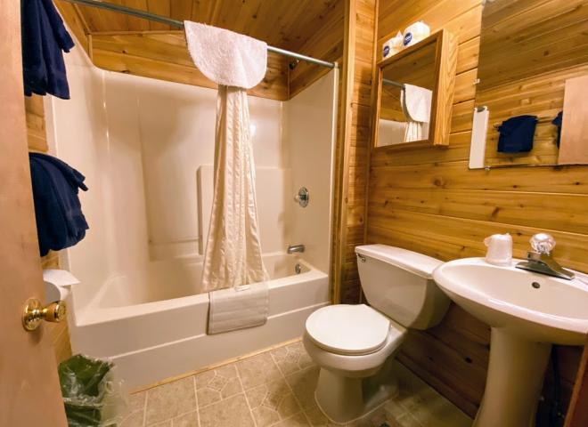 Bathroom with a standard tub/shower.