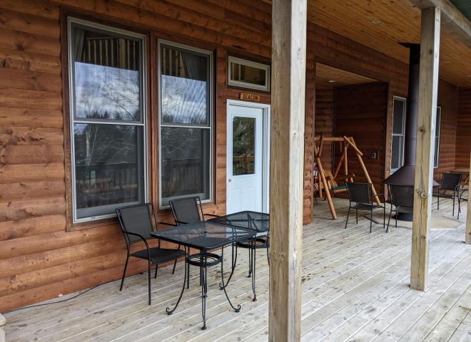 Deck entrance with seating.