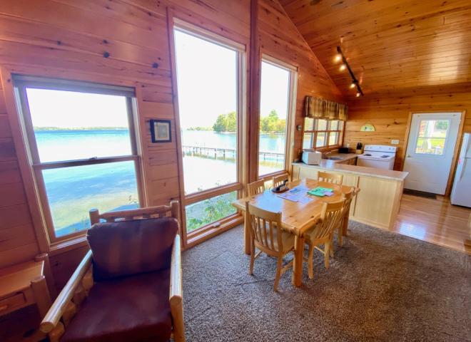 Dining area with seating for 6 that overlooks the lake.