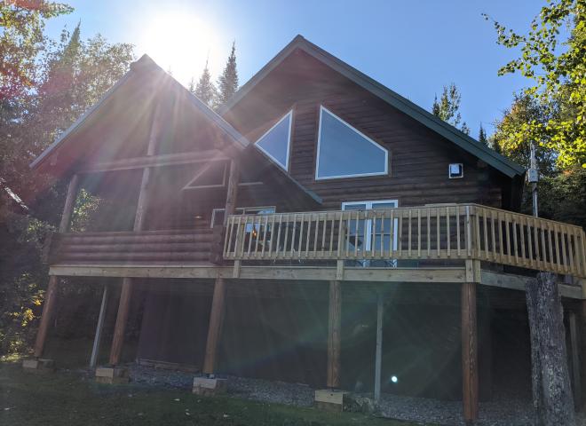 Exterior of Spinnaker with the sun rising.