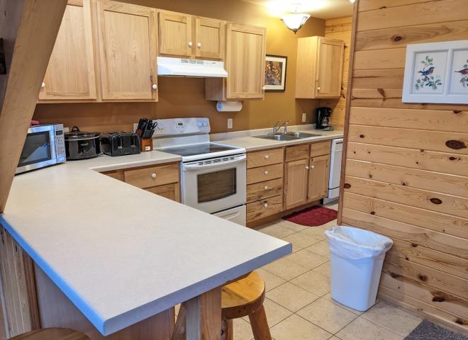 Kitchen counter with seating for three.
