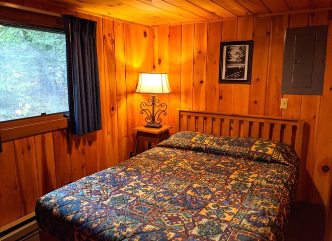 Bedroom with a queen bed.