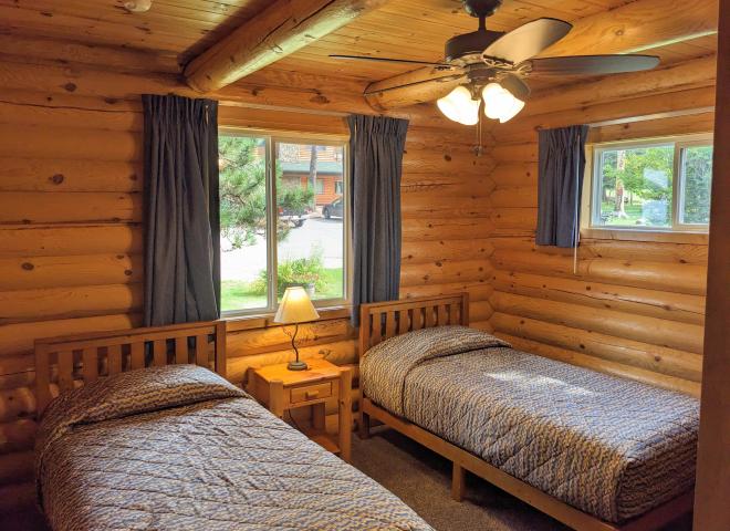 Main floor bedroom with two twin beds.