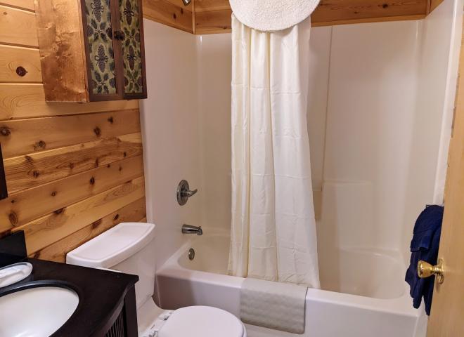 Master bathroom with a standard tub/shower.
