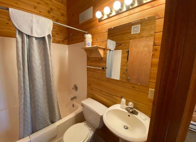 Master bathroom with a standard tub/shower.