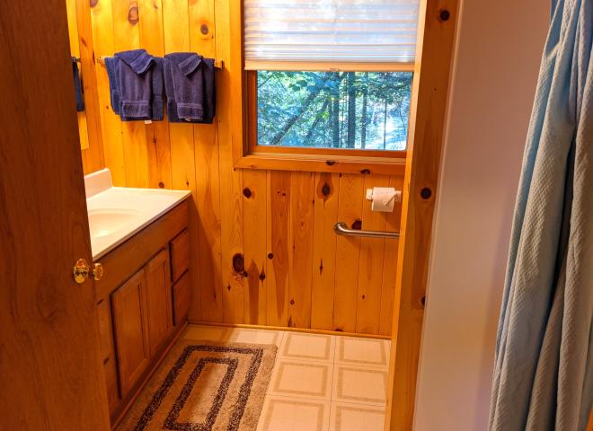 Main floor bathroom with an oversized shower stall.