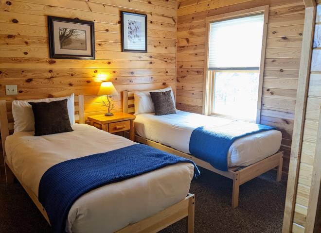 Upstairs bedroom with two XL twin beds.