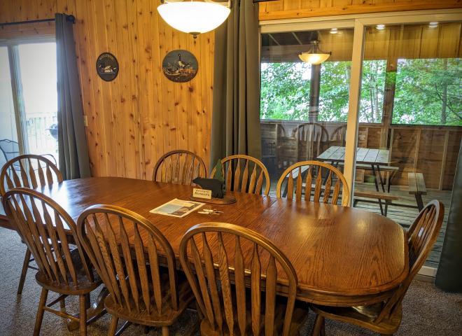 Dining Room with ample seating and access to the screen porch.
