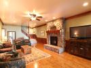 Lower level family room/rec. room with large gas fireplace and second refrigerator
