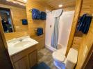 Bathroom with a standard tub and shower.