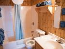 Standard bathroom with a tub shower.