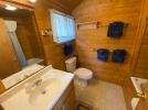 Bathroom with a standard tub and shower.