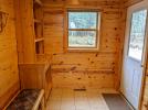 Spacious entry way with bench and storage.