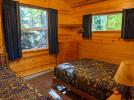 Bedroom with a double and twin bed.