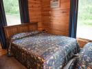 Bedroom with a queen and twin bed.