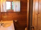 Small bathroom with a shower stall.