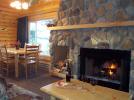 Livingroom with comfortable seating and fireplace.