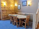 Dining room with large table.