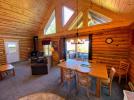 Dining room with sliding doors to a covered porch.