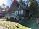 Exterior or Sandcastle cabin showing 2 levels and deck area.