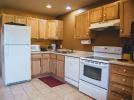 Beacon - Kitchen with a refrigerator, stove and dishwasher.