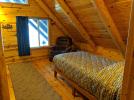 Loft bedroom with a twin bed.