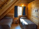 Loft bedroom with 2 twin beds.