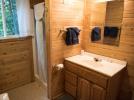 Main floor bathroom with a small shower stall.