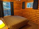 Main floor bedroom with queen bed.