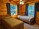 Main floor bedroom with two twin beds.