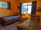 Main floor bedroom with two twin beds.